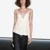Camisole-toppi napit