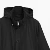 Hupullinen parka, jossa on kangasdetaljeja Hupullinen parka, jossa on kangasdetaljeja