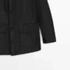 Hupullinen parka, jossa on kangasdetaljeja Hupullinen parka, jossa on kangasdetaljeja