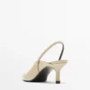 Korkeakorkoiset slingback-kengät Korkeakorkoiset slingback-kengät
