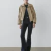 Korkeavyötäröiset, kellotetut skinny-farkut Korkeavyötäröiset, kellotetut skinny-farkut