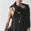 Pitsikoristeinen camisole-toppi Pitsikoristeinen camisole-toppi