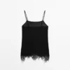 Pitsikoristeinen camisole-toppi Pitsikoristeinen camisole-toppi