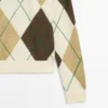 Puuvillaneulepusero, jossa on argyle-kuvio Puuvillaneulepusero, jossa on argyle-kuvio