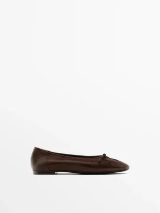 Rypytetyt ballerinat, joissa on rusetti