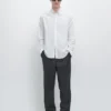 Villaiset houndstooth-housut Villaiset houndstooth-housut