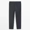 Villaiset houndstooth-housut Villaiset houndstooth-housut